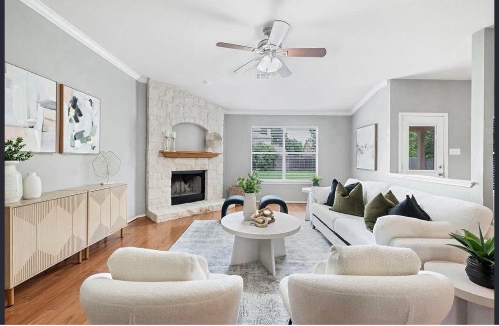 Staged living room with neutral furnishings
