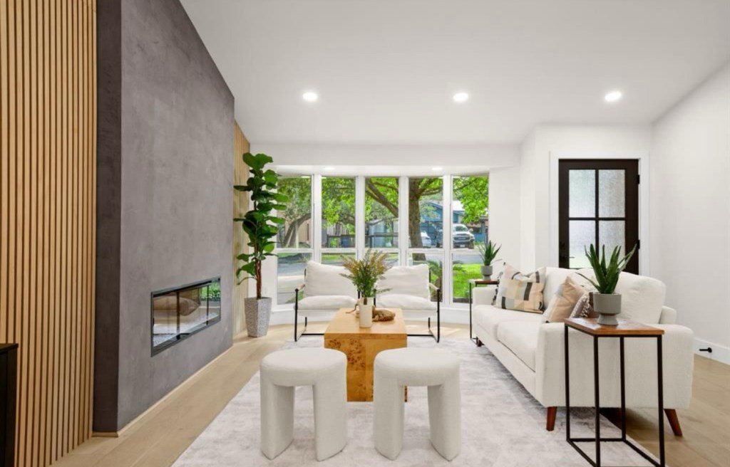 Staged open-concept living and dining space